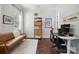 Cozy home office featuring a stylish sofa, modern desk, and ample natural light at 2637 Springway Dr, Charlotte, NC 28205