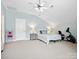 Tranquil bedroom featuring vaulted ceilings, ceiling fan, and an exercise bike at 3068 Streamhaven Dr, Lancaster, SC 29707