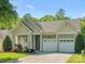 Charming home with a well-manicured lawn, a two-car garage, and beautiful landscaping at 3068 Streamhaven Dr, Lancaster, SC 29707