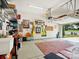 Spacious garage with storage shelves, tools, and an open door at 3068 Streamhaven Dr, Lancaster, SC 29707