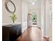 Hallway with beautiful wood floors, white wainscoting, and an open view to the front door at 3068 Streamhaven Dr, Lancaster, SC 29707