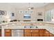Kitchen with granite countertops, stainless steel appliances, and an open view to the living room at 3068 Streamhaven Dr, Lancaster, SC 29707