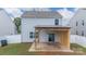 Spacious backyard with a covered patio, wooden posts, trash can and privacy fence at 316 Gaines Rd, Clover, SC 29710