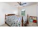 Bedroom shows a bed with floral covers, window and ceiling fan at 316 Gaines Rd, Clover, SC 29710