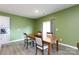 Dining room with wood flooring, wooden table and chairs, and natural light at 316 Gaines Rd, Clover, SC 29710