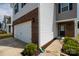 Charming home exterior featuring a garage, brick accents, and a well-maintained yard at 316 Gaines Rd, Clover, SC 29710