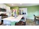 Bright kitchen features stainless steel appliances, white countertops, and a large center island at 316 Gaines Rd, Clover, SC 29710