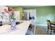 Kitchen featuring stainless steel appliances, light grey cabinetry and green walls at 316 Gaines Rd, Clover, SC 29710