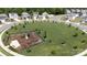 Community playground with surrounding green space and well-maintained homes in a Gathering friendly neighborhood at 316 Gaines Rd, Clover, SC 29710
