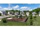 Community playground surrounded by well-maintained lawns and single Gathering homes on a sunny day at 316 Gaines Rd, Clover, SC 29710