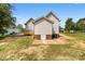 Backyard featuring a concrete patio and lawn at 317 S Pink St, Cherryville, NC 28021