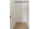 This is a walk-in closet with a hanging bar and shelf above at 317 S Pink St, Cherryville, NC 28021