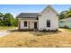 Charming renovated home with a well-maintained front yard, and inviting porch at 317 S Pink St, Cherryville, NC 28021