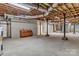 Unfinished basement with exposed ductwork, wooden support beams, and a concrete floor at 332 E Rebound Rd, Lancaster, SC 29720