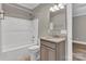 Bathroom with a tub/shower combination, single sink vanity, and neutral color scheme at 332 E Rebound Rd, Lancaster, SC 29720