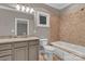 Stylish bathroom featuring granite countertops, tiled floors, and combined bathtub and shower at 332 E Rebound Rd, Lancaster, SC 29720