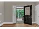 Welcoming entryway with decorative glass door that provides view to wooded front yard at 332 E Rebound Rd, Lancaster, SC 29720