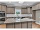 Gourmet kitchen with island, granite countertops, stainless steel appliances and skylight at 332 E Rebound Rd, Lancaster, SC 29720