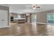 Open concept kitchen with gray cabinets, large island, stainless appliances and abundant light at 332 E Rebound Rd, Lancaster, SC 29720