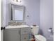 Modern half bathroom with gray vanity and stylish decor at 3340 Blue Jay Pass, Fort Mill, SC 29708