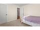 Bright bedroom with carpet floors, a closet, and natural light from a window, creating a cozy atmosphere at 3340 Blue Jay Pass, Fort Mill, SC 29708