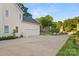 View of house from the rear with a long drive and a two-car garage at 3340 Blue Jay Pass, Fort Mill, SC 29708