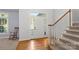 Bright foyer with hardwood floors, staircase, and natural light at 3340 Blue Jay Pass, Fort Mill, SC 29708