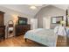 Inviting primary bedroom with plenty of space, complete with hardwood floors and a vaulted ceiling at 3340 Blue Jay Pass, Fort Mill, SC 29708