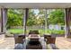 Inviting patio area with comfortable seating surrounding a fire pit, perfect for outdoor gatherings at 3340 Blue Jay Pass, Fort Mill, SC 29708