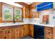 Kitchen showcases custom wood cabinets, a white countertop, and stainless steel appliances for modern cooking at 3418 Sulphur Springs Ne Rd, Hickory, NC 28601