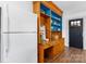Kitchen provides ample storage with custom wood cabinetry, contrasting blue accents, and bright natural light at 3418 Sulphur Springs Ne Rd, Hickory, NC 28601