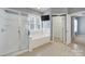Bright bathroom with a glass shower, a large tub, and a window at 3426 Richards Xing, Fort Mill, SC 29708