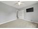 Neutral bedroom featuring carpet, ceiling fan, closet, and a wall-mounted television at 3426 Richards Xing, Fort Mill, SC 29708