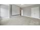 Spacious carpeted bedroom with a ceiling fan, a movie screen, and double door closet at 3426 Richards Xing, Fort Mill, SC 29708