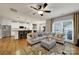 Open-concept living room and kitchen with stainless steel appliances at 3426 Richards Xing, Fort Mill, SC 29708