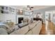 Comfortable living room featuring fireplace, piano, and hardwood floors at 3426 Richards Xing, Fort Mill, SC 29708