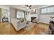Cozy living room with fireplace, built-in shelves, and hardwood floors at 3426 Richards Xing, Fort Mill, SC 29708