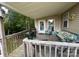 Back porch with furniture to enjoy a view of the private wooded lot at 3690 Birchwood Ln, Denver, NC 28037