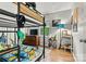 Bedroom with bunkbed, wood floors, and a playful design at 3690 Birchwood Ln, Denver, NC 28037