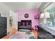 Bedroom with crib, changing table and colorful decor at 3690 Birchwood Ln, Denver, NC 28037