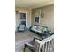 Cozy front porch with comfortable seating and a view of the neighborhood at 3690 Birchwood Ln, Denver, NC 28037