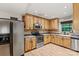 Functional kitchen featuring ample cabinets and stainless steel appliances, offering a practical and efficient space at 3690 Birchwood Ln, Denver, NC 28037