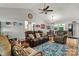Open concept featuring vaulted ceiling, creating a welcoming space that connects to a kitchen and dining area at 3690 Birchwood Ln, Denver, NC 28037