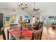 Open-concept with vaulted ceiling, seamlessly connects the dining area with the living room, creating a great flow at 3690 Birchwood Ln, Denver, NC 28037