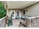 Inviting covered porch featuring comfortable seating and peaceful outdoor views at 3690 Birchwood Ln, Denver, NC 28037
