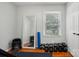 Workout room in basement with exercise equipment and weight sets at 3918 Rea Rd, Charlotte, NC 28226