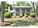 Inviting two-story home with a well-kept lawn, black shutters, and lovely curb appeal at 3918 Rea Rd, Charlotte, NC 28226