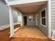 Covered back patio perfect for outdoor entertaining at 4021 Grommet Ct # 4, Matthews, NC 28105