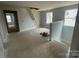Spacious bonus room with natural light, offering a versatile area for recreation or relaxation upstairs at 4021 Grommet Ct, Matthews, NC 28105