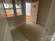 Bright entryway with a white front door and views of the home's exterior through the window at 4021 Grommet Ct, Matthews, NC 28105